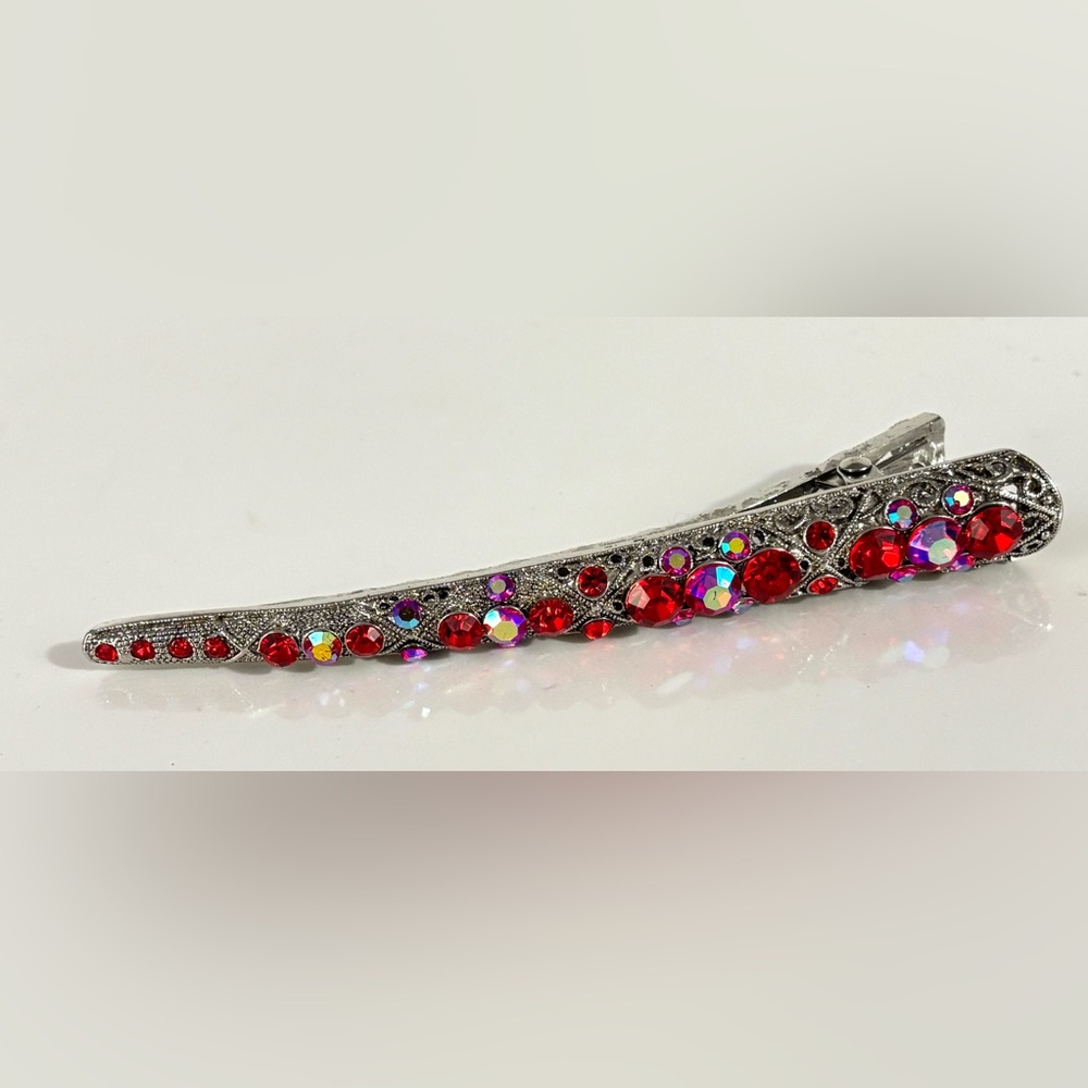 🌷5/25$ silver-toned hair clip decorated with red and iridescent rhinestones